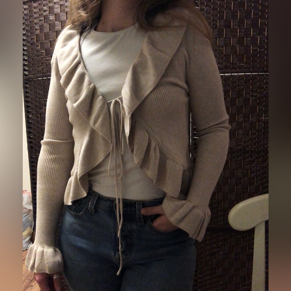 Cream colored ruffle tie front cardigan
